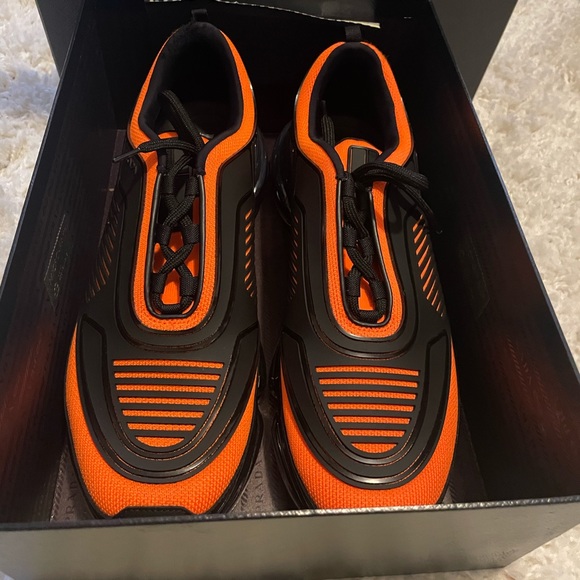 Prada Cloudbust Sneakers
Sz. 10 Black/Orange - Picture 2 of 3